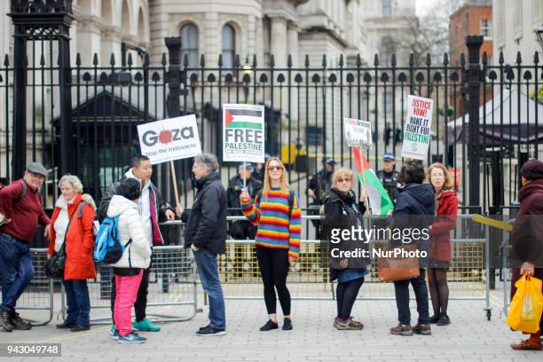 Protesters outside Downing Street at the Protest for Gaza Protesters flocked to Whitehall, opposite Downing Street in London, UK, on 7 April 2018 to...