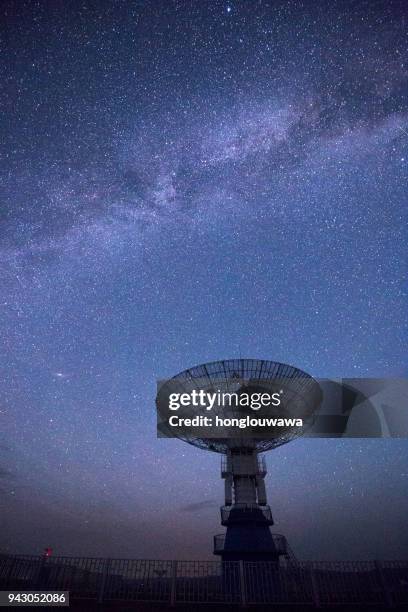 galaxy and radio telescope - astronomical telescope stock pictures, royalty-free photos & images