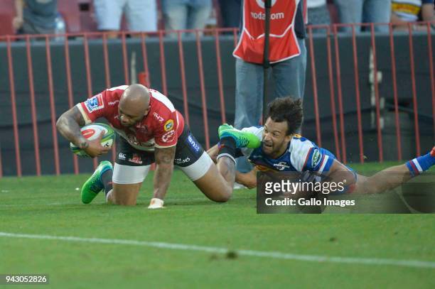 Lionel Mapoe of the Emirates Lions scores during the Super Rugby match between Emirates Lions and DHL Stormers at Emirates Airline Park on April 07,...