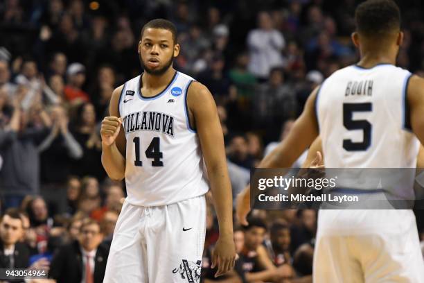 Omari Spellman of the Villanova Wildcats celebrates a shot during the 2018 NCAA Men's Basketball Tournament East Regional against the Texas Tech Red...