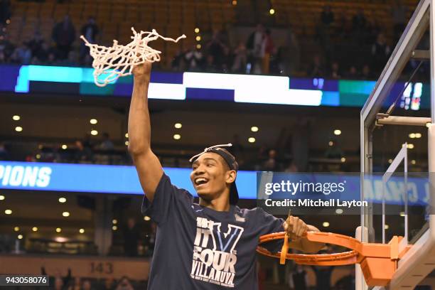 Jermaine Samuels of the Villanova Wildcats cuts the net down after winning the 2018 NCAA Men's Basketball Tournament East Regional against the Texas...