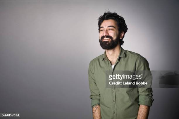 portrait of  middle eastern man with beard - waist up stock pictures, royalty-free photos & images