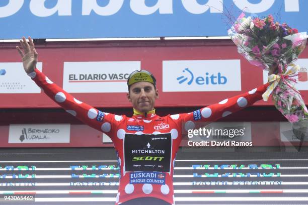 Podium / Carlos Verona Quintanilla of Spain and Team Mitchelton-Scott Polka Dot Mountain Jersey / Celebration / Flowers / Children / during the 58th...