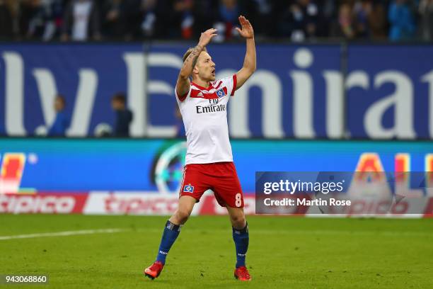 Lewis Holtby of Hamburg celebrates after he scored a goal to make it 2:1 during the Bundesliga match between Hamburger SV and FC Schalke 04 at...