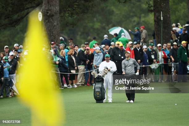 Martin Kaymer of Germany prepares to play on the second hole with caddie Craig Connelly during the third round of the 2018 Masters Tournament at...