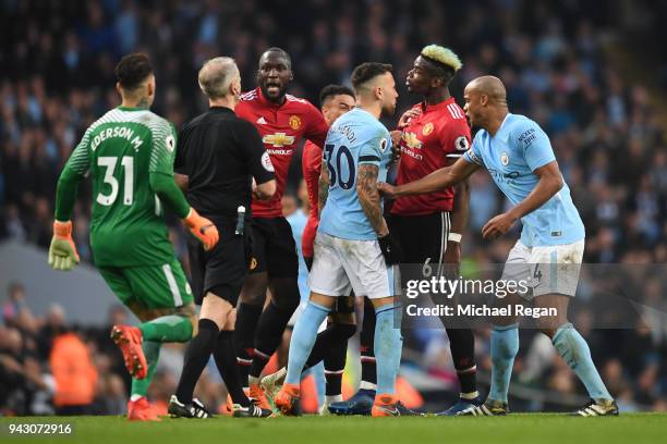 Manchester United and Manchester City players clash during the Premier League match between Manchester City and Manchester United at Etihad Stadium...