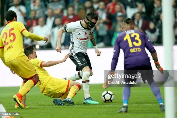 Negredo of Besiktas in action against Castro of Goztepe during the Turkish Super Lig soccer match between Besiktas and Goztepe at Vodafone Park in...