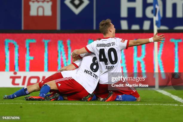 Aaron Hunt of Hamburg celebrates with his team after he scored a goal to make it 3:2 during the Bundesliga match between Hamburger SV and FC Schalke...