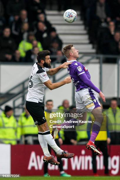 Bolton Wanderers' Josh Vela competing with Derby County's Joe Ledley during the Sky Bet Championship match between Derby County and Bolton Wanderers...