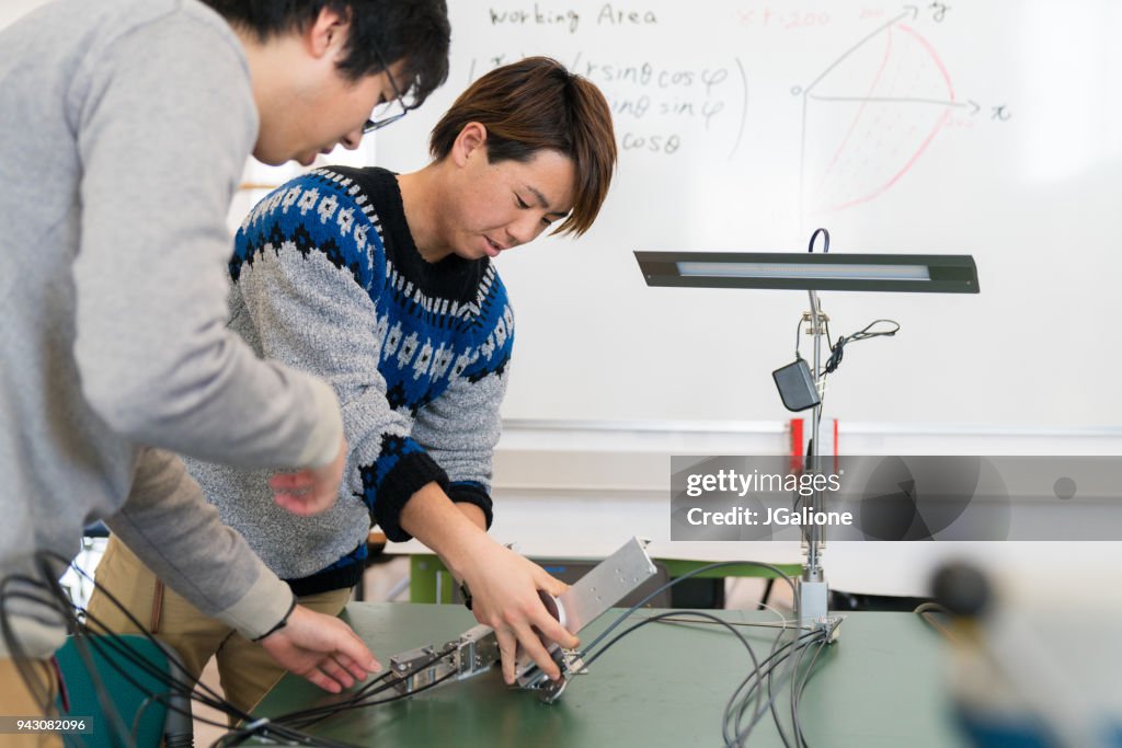 Robotics students working together