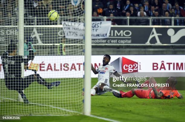 Amiens' Togolese forward Serge Gakpe kicks to score a goal during the French L1 football match between Amiens and Caen on April 7, 2018 at the...