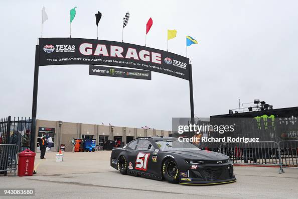 Harrison Rhodes Racing Harrison Rhodes, driver of the Chevrolet, drives through the garage ...