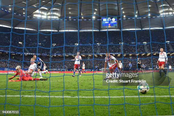 Guido Burgstaller of Schalke scores a goal to make it 2:2 during the Bundesliga match between Hamburger SV and FC Schalke 04 at Volksparkstadion on...