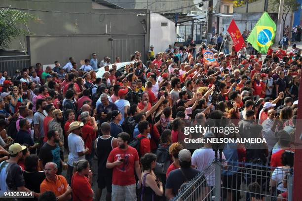 Supporters of Brazilian ex-president Luiz Inacio Lula da Silva block the metalworkers' union building garage exit in Sao Bernardo do Campo, in...