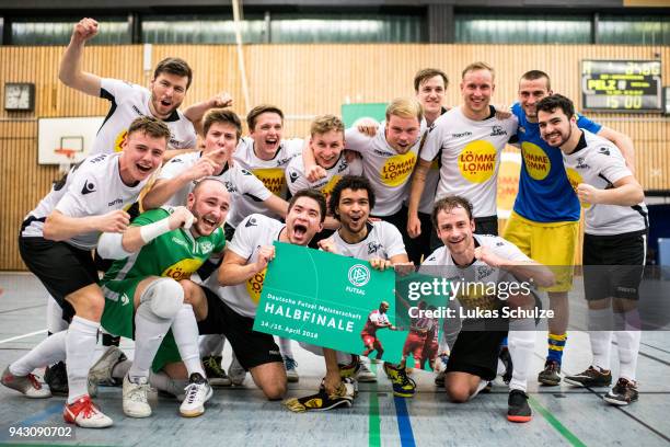 Team of Koeln celebrate their win after the quarter final match of the German Futsal Championship 2018 between Futsal Panthers Koeln and Hamburger...