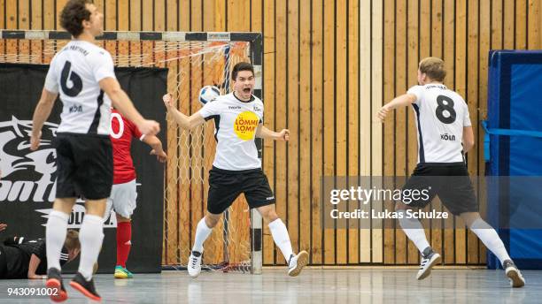 Scorer Jilo Hirosawa of Koeln celebrates with team mates their teams first goal during the quarter final match of the German Futsal Championship 2018...