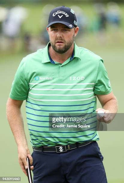 Marc Leishman of Australia waves on the second green during the third round of the 2018 Masters Tournament at Augusta National Golf Club on April 7,...