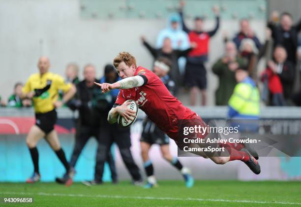 Scarlets' Rhys Patchell scores his sides third try during the Guinness PRO14 Round 19 match between Scarlets and Glasgow Warriors at Parc y Scarlets...