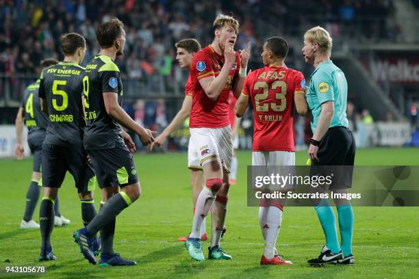 Wout Weghorst of AZ Alkmaar, Ricardo van Rhijn of AZ Alkmaar, referee Kevin Blom during the Dutch Eredivisie match between AZ Alkmaar v PSV at the...