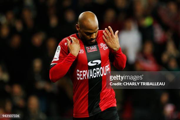 Guingamp's French forward Jimmy Briand celebrates after scoring a goal during the French L1 football match between Guingamp and Troyes on April 7 at...