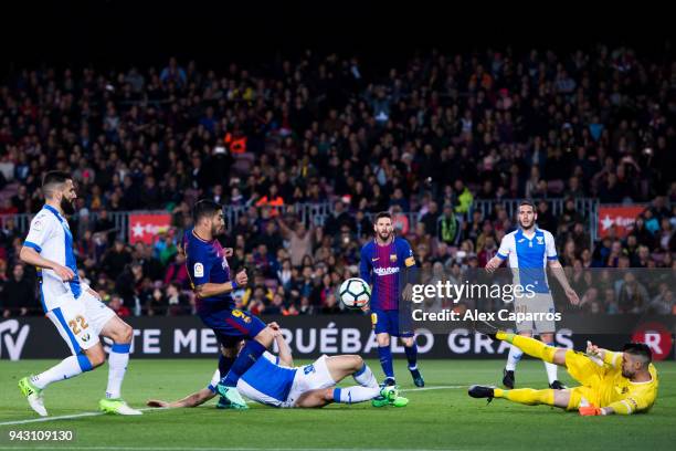 Goalkeeper Ivan Cuellar of CD Leganes saves a header from Luis Suarez of FC Barcelona during the La Liga match between Barcelona and Leganes at Camp...