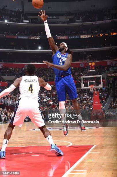 Montrezl Harrell of the LA Clippers shoots the ball against the Denver Nuggets on April 7, 2018 at STAPLES Center in Los Angeles, California. NOTE TO...