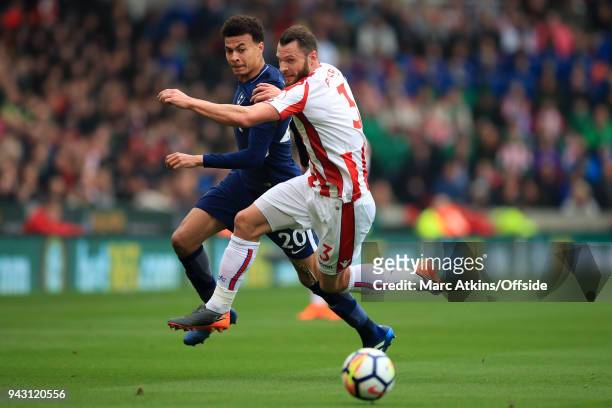 Erik Pieters of Stoke City in action with Dele Alli of Tottenham Hotspur during the Premier League match between Stoke City and Tottenham Hotspur at...