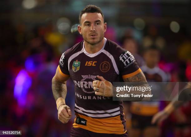 Darius Boyd of the Broncos leads his team out onto the ground during the round five NRL match between the Newcastle Knights and the Brisbane Broncos...