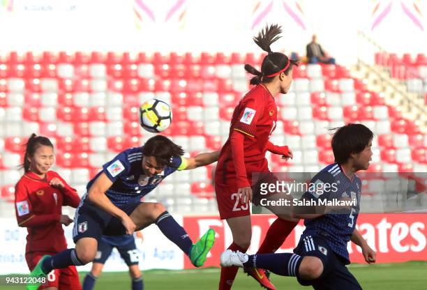 Japan's Nana ICHISE and Mizuho SAKAGUCHI compete with Vietnam's PHAM Hoang Quynh and NGUYEN Thi Lieu during their match for the AFC Women's Asian Cup...