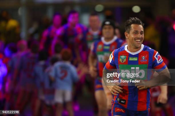 Mitchell Pearce of the Knights leads his team out onto the ground during the round five NRL match between the Newcastle Knights and the Brisbane...