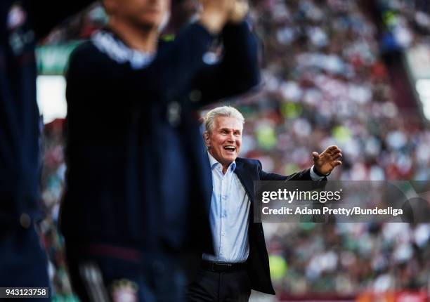 Jupp Heynckes head coach of Bayern Munich celebrates after Arjen Robben of Bayern Munich scored the third goal in the Bundesliga match between FC...