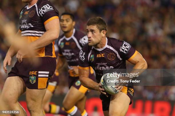 Andrew McCullough of the Broncos runs the ball during the round five NRL match between the Newcastle Knights and the Brisbane Broncos at McDonald...