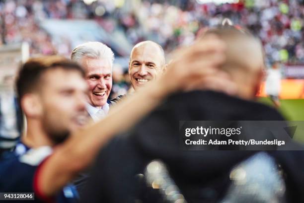 Jupp Heynckes head coach of Bayern Munich celebrates with Arjen Robben of Bayern Munich after victory in the Bundesliga match between FC Augsburg and...