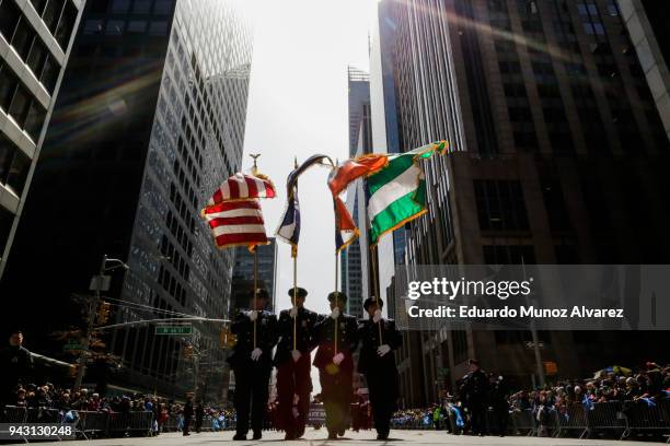 Officers and Bagpipers march along 6av during the Annual Tartan Day Parade on April 7, 2018 in New York City. The Tartan day is a Scottish...