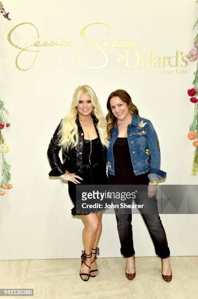 Jessica Simpson and Tina Simpson take photos during a spring style event in Dillards at The Mall at Green Hills hosted by Jessica Simpson on April 7,...