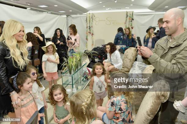 Jessica Simpson takes photos with army wives and kids during a spring style event in Dillards at The Mall at Green Hills hosted by Jessica Simpson on...