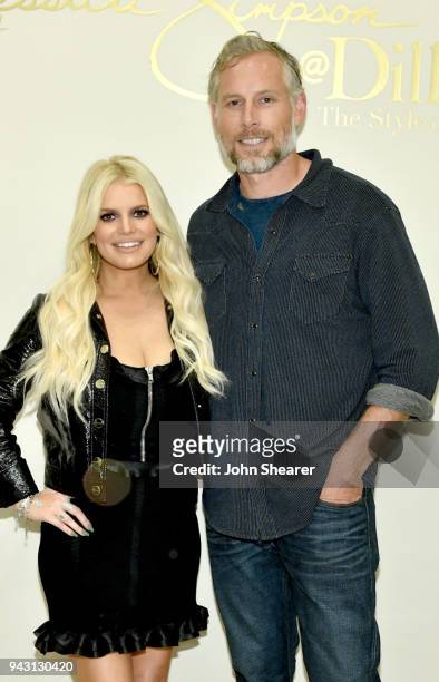 Jessica Simpson and Eric Johnson take photos during a spring style event in Dillards at The Mall at Green Hills hosted by Jessica Simpson on April 7,...