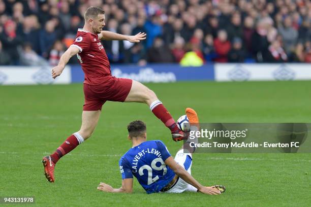 Dominic Calvert-Lewin of Everton and Jordan Henderson challenge for the ball during the Premier League match between Everton and Liverpool at...