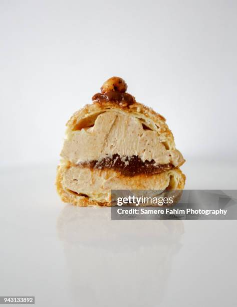 cross section of a paris-brest with praline - quaregnon stock pictures, royalty-free photos & images