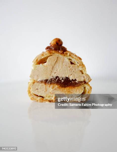 cross section of a paris-brest with praline - pastry stock pictures, royalty-free photos & images