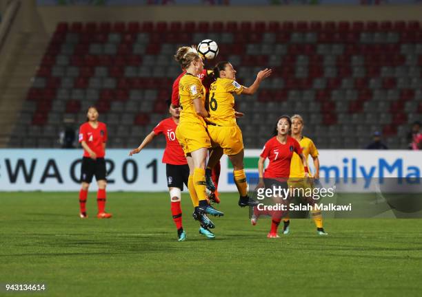 Clare Polkinghorne and Chloe Logarzo battle for the ball with Korea Republic players during the AFC Women's Asian Cup Group B match between Australia...