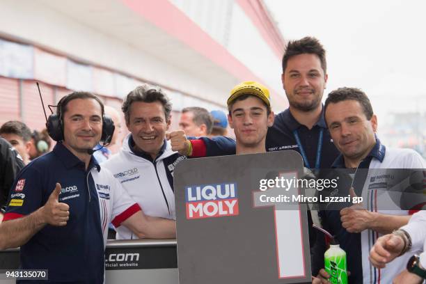 Tony Arbolino of Italy and Marinelli Snipers Team Honda celebrates with team the Moto3 pole position at the end of the qualifying practice during the...