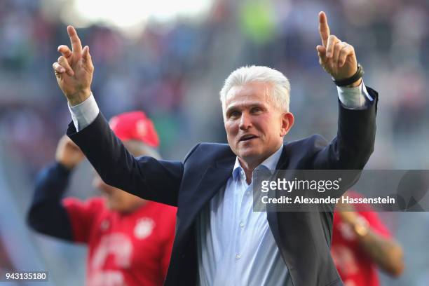 Jupp Heynckes, head coach of Bayern Muechen, celebrates in front of their supporters after the Bundesliga match between FC Augsburg and FC Bayern...