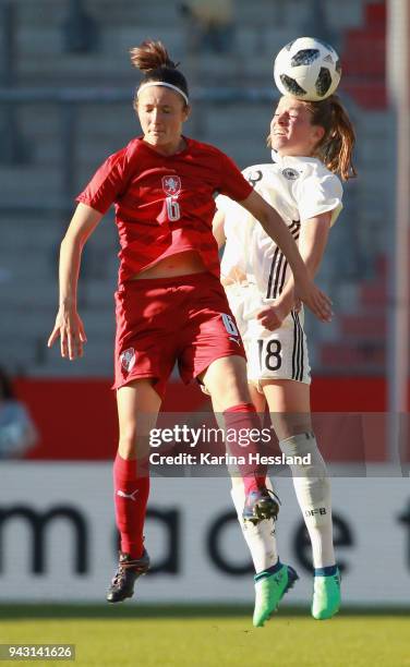 Melanie Leupolz of Germany and Eva Bartonova of Czech Republic jump for a header during the 2019 FIFA Womens World Championship Qualifier match...