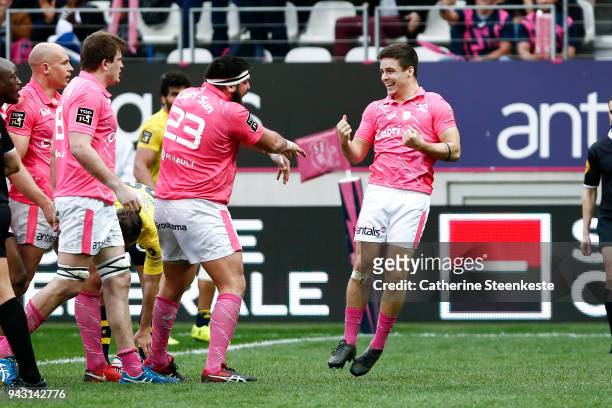 Arthur Coville of Stade Francais Paris just scored a try and celebrates with Ramiro Herrera of Stade Francais Paris during the French Top 14 match...
