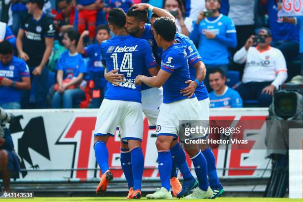 Edgar Mendez of Cruz Azul celebrates with teammates after scoring the first goal of his team during the 14th round match between Cruz Azul and Lobos...