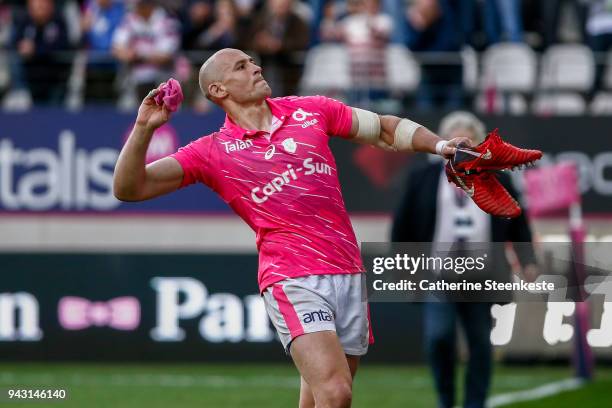 Sergio Parisse of Stade Francais Paris throws his socks to the fans after the French Top 14 match between Stade Francais Paris and ASM Clermont...