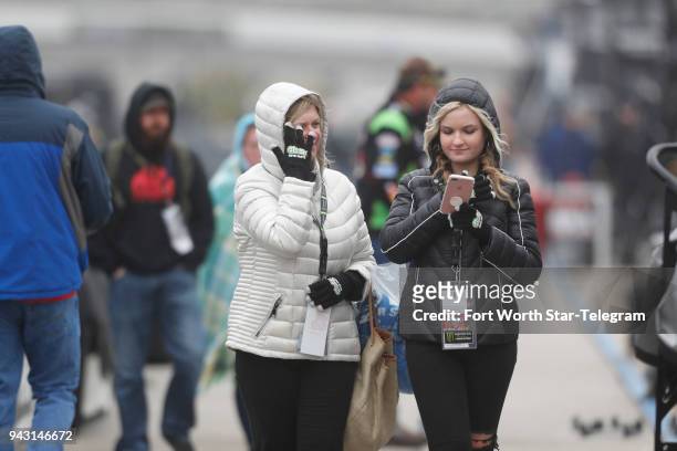 Nancy and Taylor Newell from Chicago walk the pits before the start of the Xfinity Series My Bariatric Solutions 300 at Texas Motor Speedway in Fort...