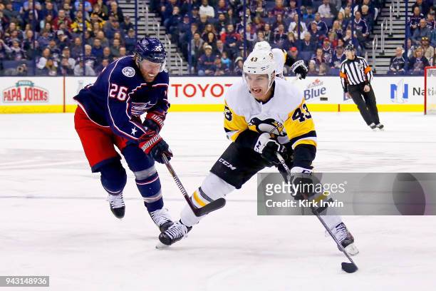 Thomas Vanek of the Columbus Blue Jackets attempts to steal the puck from Conor Sheary of the Pittsburgh Penguins during the game on April 5, 2018 at...