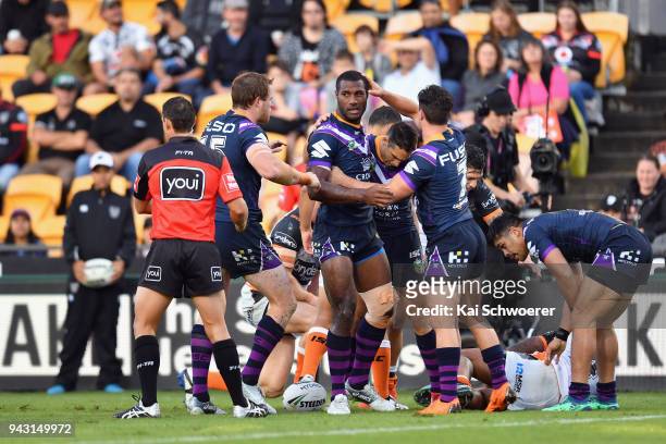 Suliasi Vunivalu of the Storm and his team mates react during the round five NRL match between the Wests Tigers and the Melbourne Storm at Mt Smart...